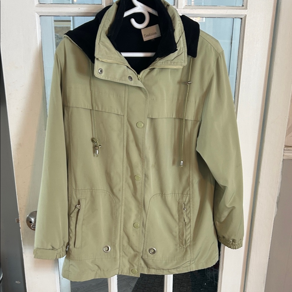 Q35.   Light Green Jacket